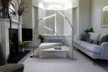 Load image into Gallery viewer, 3 floor lamps in different colours (ice grey front, brushed steel middle, rose gold back) in a living room