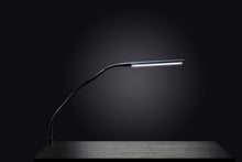Load image into Gallery viewer, Electra table lamp being used in a bare dark room