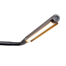 Load image into Gallery viewer, Daylight Electra LED light. The head of the lamp is shown, featuring a black outer shell and a rotating knob for altering colour temperature and light intensity.