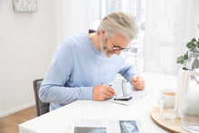 Load image into Gallery viewer, Man writing under Scribolux