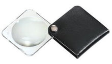 Load image into Gallery viewer, Circular magnifier inside clear square setting, with attached fold-out black case