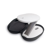 Load image into Gallery viewer, Daylight's Foldi lamp, half extended, half in the travel bag.
