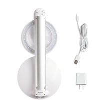 Load image into Gallery viewer, White LED lamp, folded to be compact with  USB cable on a white background
