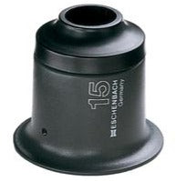 Small circular, black magnifier with round base and eyepiece