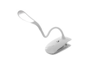 Small clip-on daylight lamp, with bendable arm holding light.