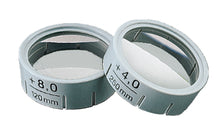2 reading caps for Galilean systems, one in +8.0 magnification and the other with +4.0