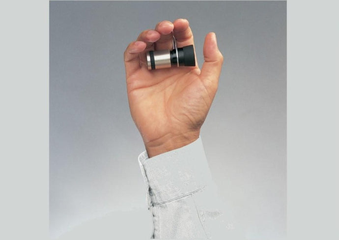 Hand holding Keplerian system/ handheld monocular by attached ring