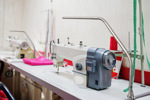 Slimline table lamp over a sewing machine.