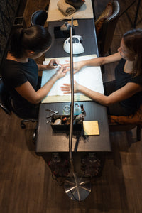 Daylight's Slimline Floor-standing lamp being used in a nail salon.